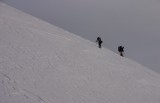 shasta23 Claire traverses the slope to our campsite while Chuck waits for the rest of the group.