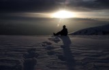 shasta27 I'm silhouetted against the setting sun. I had to look really closely to differentiate the two similar photos.