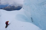 img_0327 Eu-Jin getting ready to downclimb a short section just below the bergshrund on Tocllaraju on the descent. Photo by Jared Brown.