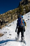 crw_2414 Natalie snowshoeing up the first switchbacks from Agnew Lake to Spooky Meadow.